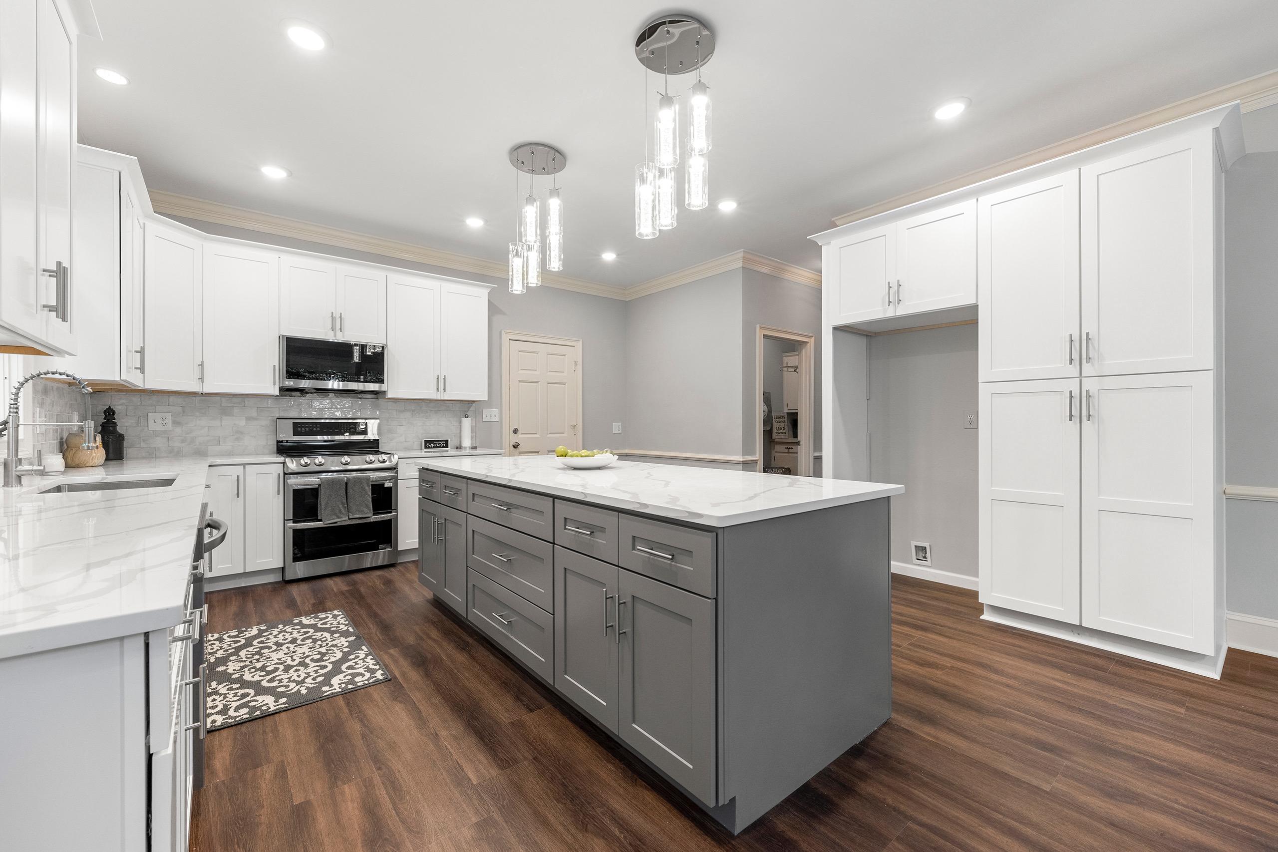 Modern kitchen with white-grey shaker cabinets